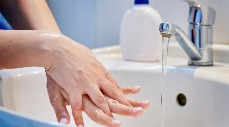 senior wash hands