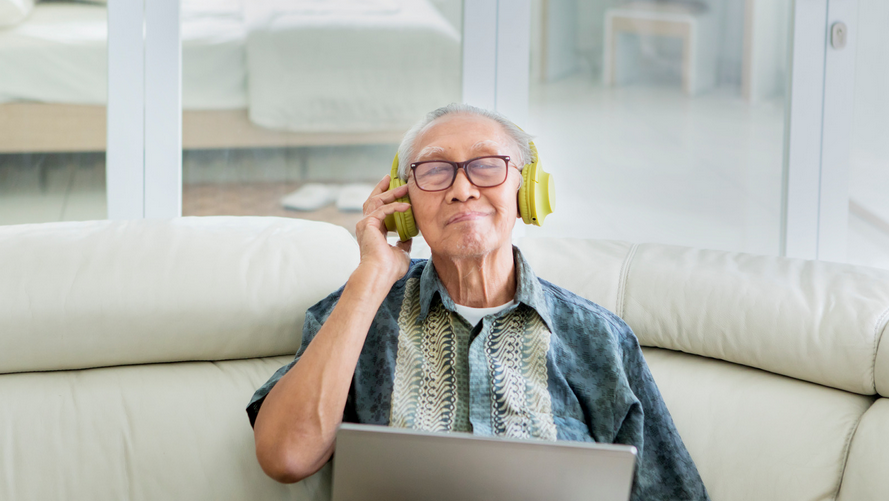 senior listening to music